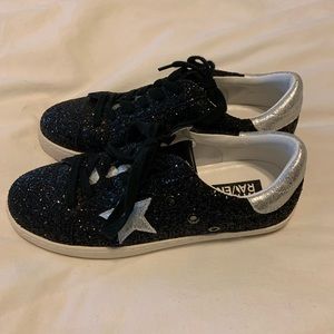 Black and silver sequin sneakers.